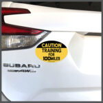CAUTION Training For 100 Miles Runner Decal or Car Magnet